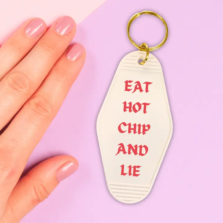 A humorous motel-style keychain featuring the phrase 'Don't make me get medieval on your ass', designed in a classic hotel key tag style.