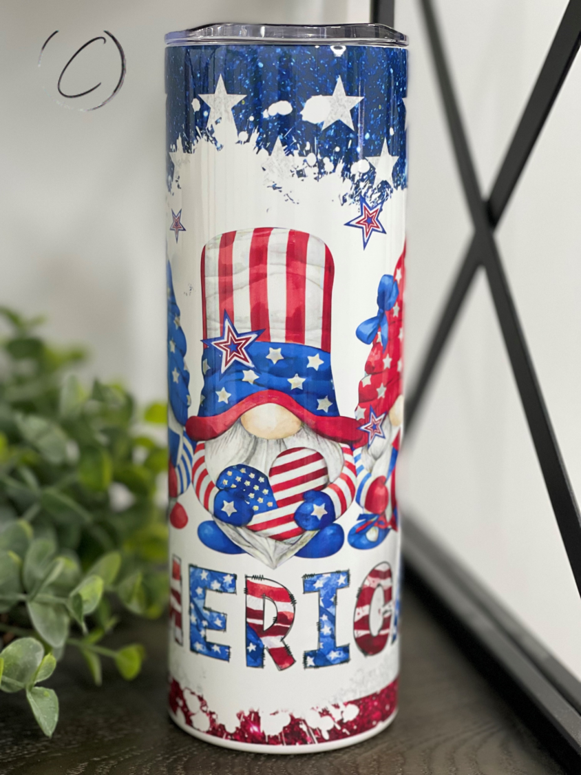 America Gnomes 20oz Skinny Tumbler featuring a vibrant gnome design, reusable straw, and durable construction.