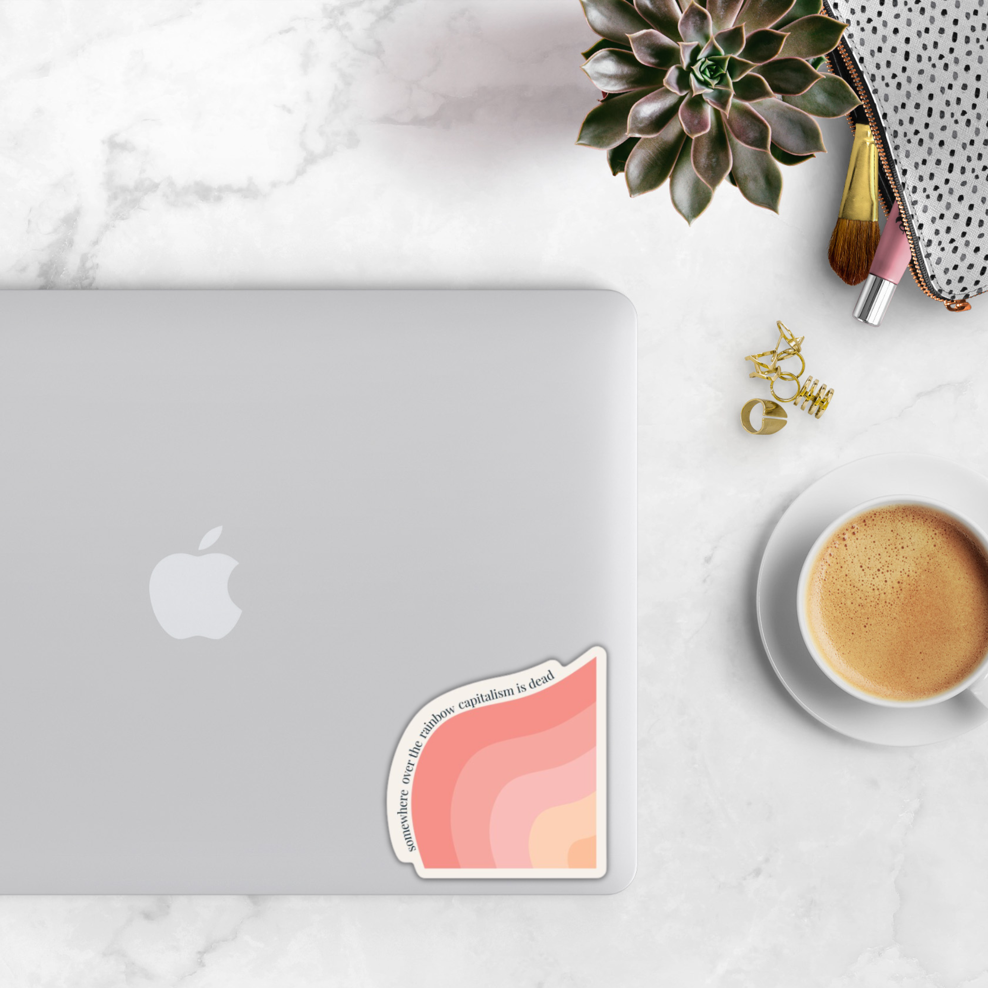 A collection of four anti-capitalism vinyl stickers featuring bold designs and messages, perfect for personalizing laptops and water bottles.