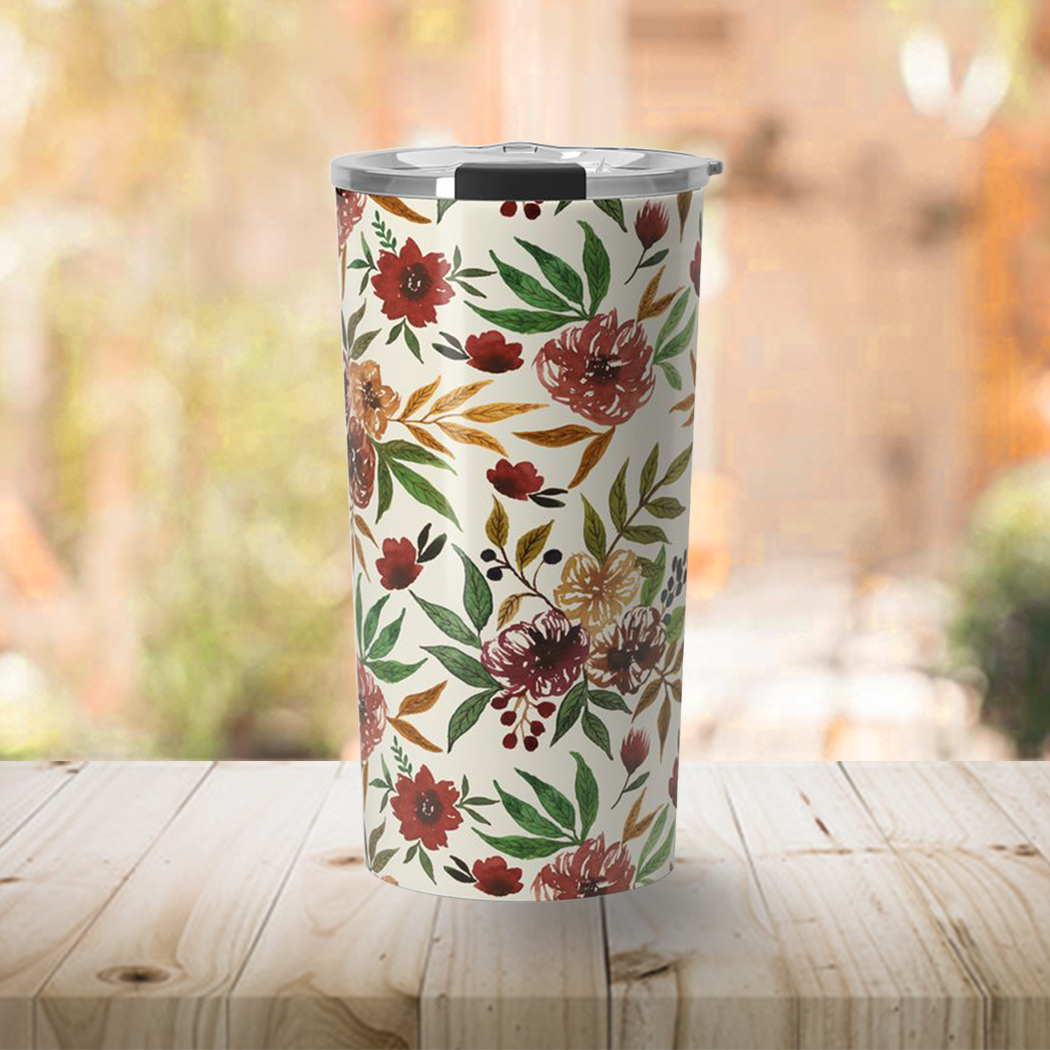 A stylish Autumn Flowers Travel Mug featuring vibrant floral designs, made of stainless steel with a vacuum-sealed lid.