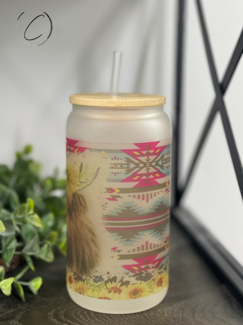 Aztec Sunflower Highland Cow 16oz Libbey Glass with a vibrant sunflower design and reusable straw.