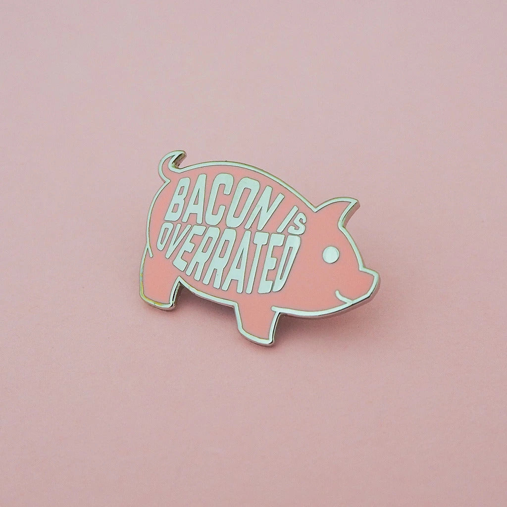 Bacon Is Overrated Enamel Pin featuring a cute pink pig design, made of hard enamel with silver plating.