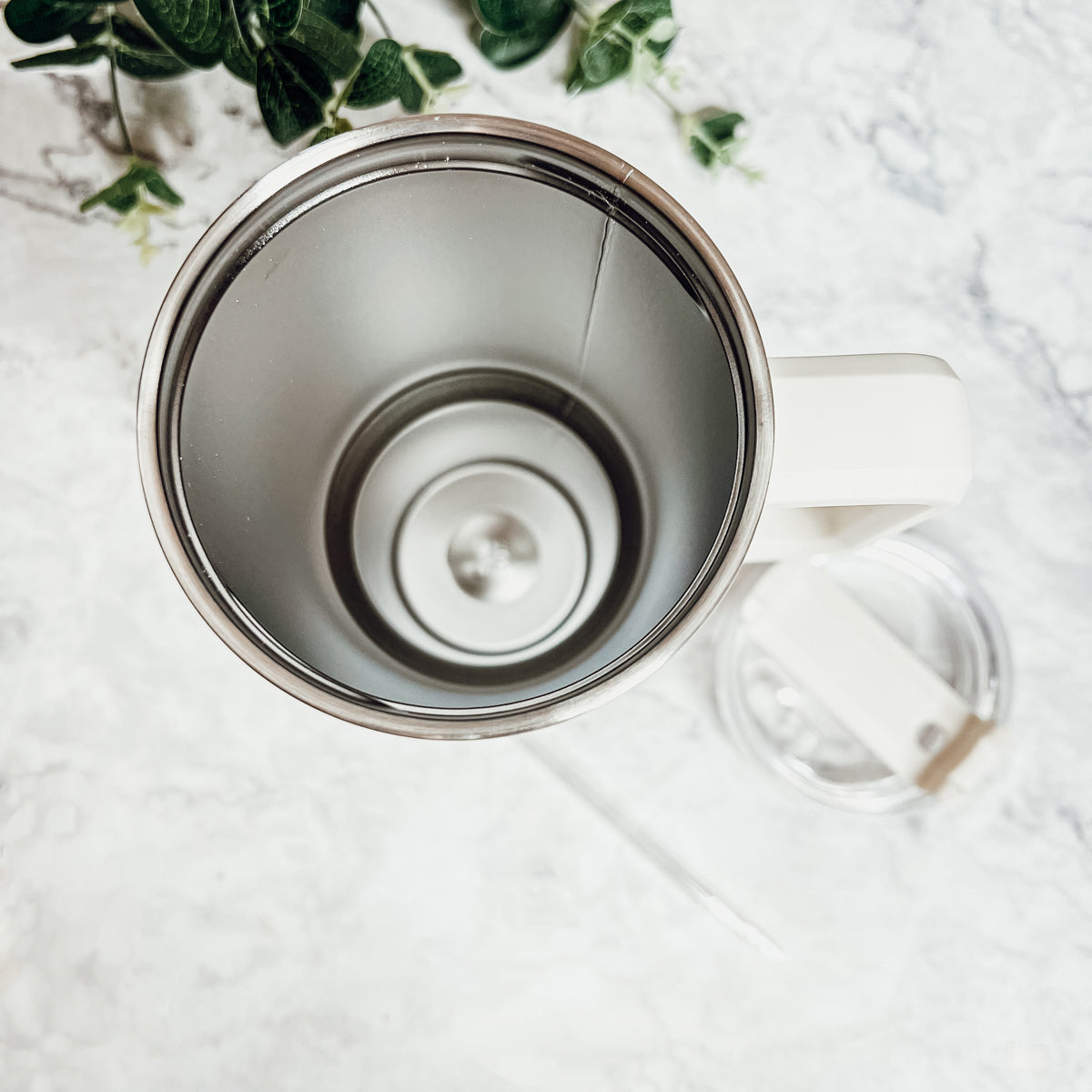 Be Happy 40oz insulated mug with handle, lid, and straw, featuring a matte cream finish and black graphic design.