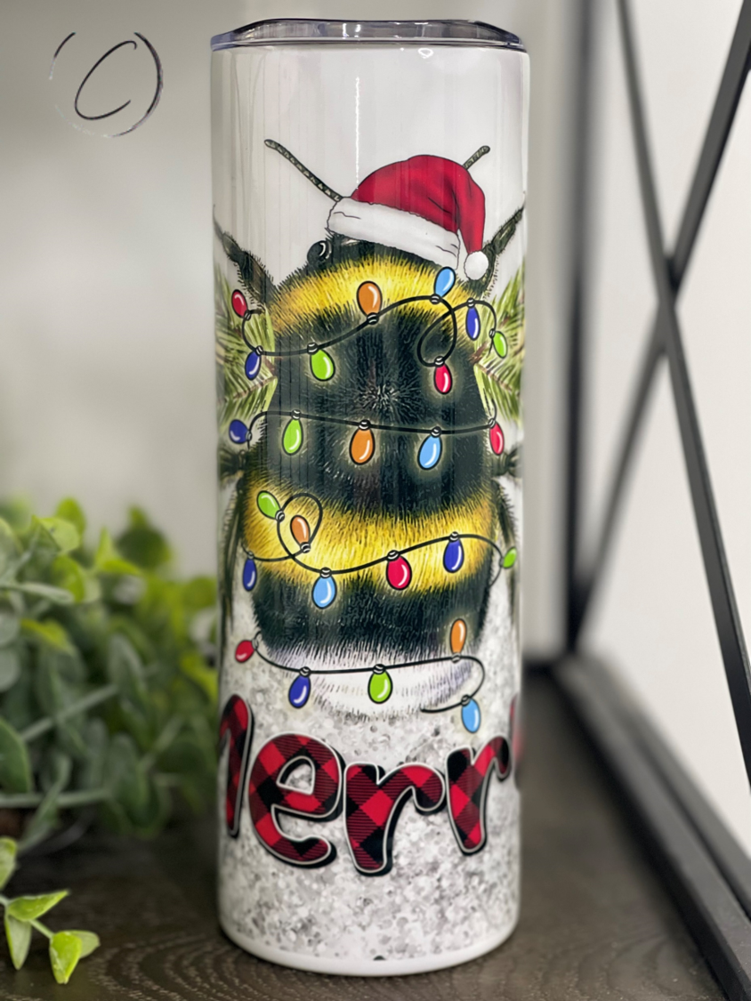 Bee Merry 20oz Skinny Tumbler featuring a vibrant full wrap design, perfect for stylish hydration.