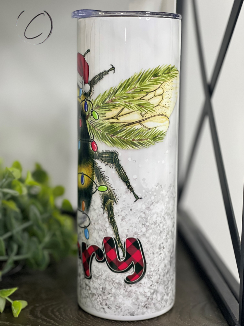Bee Merry 20oz Skinny Tumbler featuring a vibrant full wrap design, perfect for stylish hydration.