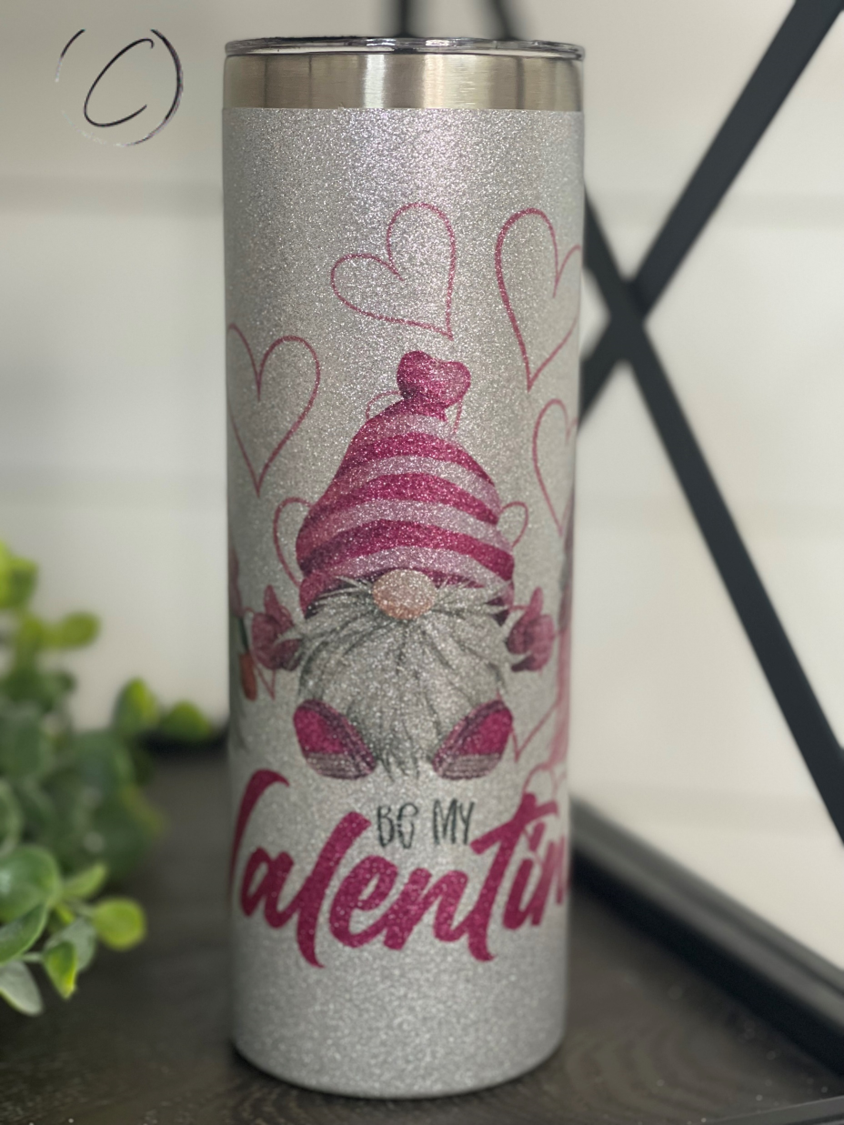 Be Mine Valentine Gnomes 20oz Glitter Skinny Tumbler with vibrant glitter and gnome design, perfect for Valentine's Day.