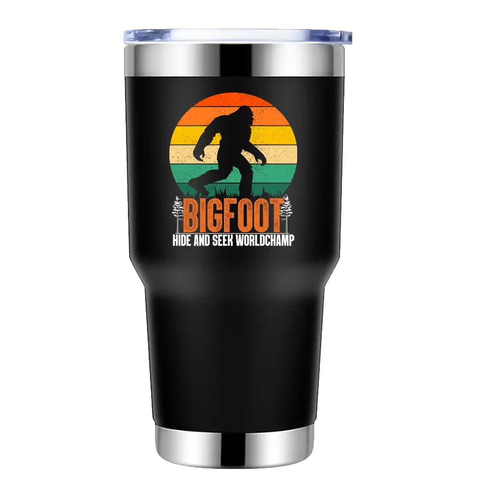 Bigfoot Hide And Seek Worldchamp 30oz Insulated Vacuum Sealed Tumbler with a vibrant design, showcasing its stainless steel construction and splash-proof lid.