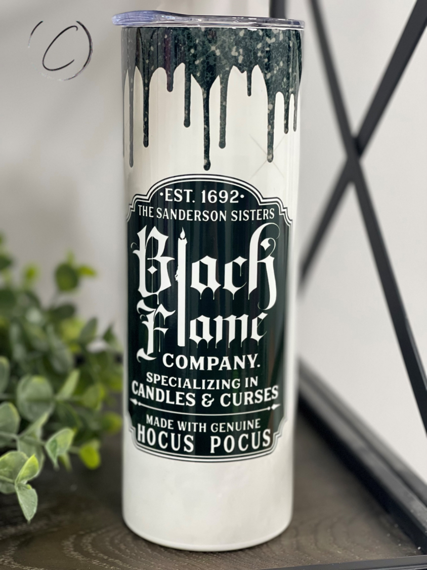 Black Flame Candle Company 20oz Skinny Tumbler with a vibrant full wrap design, includes a reusable straw.
