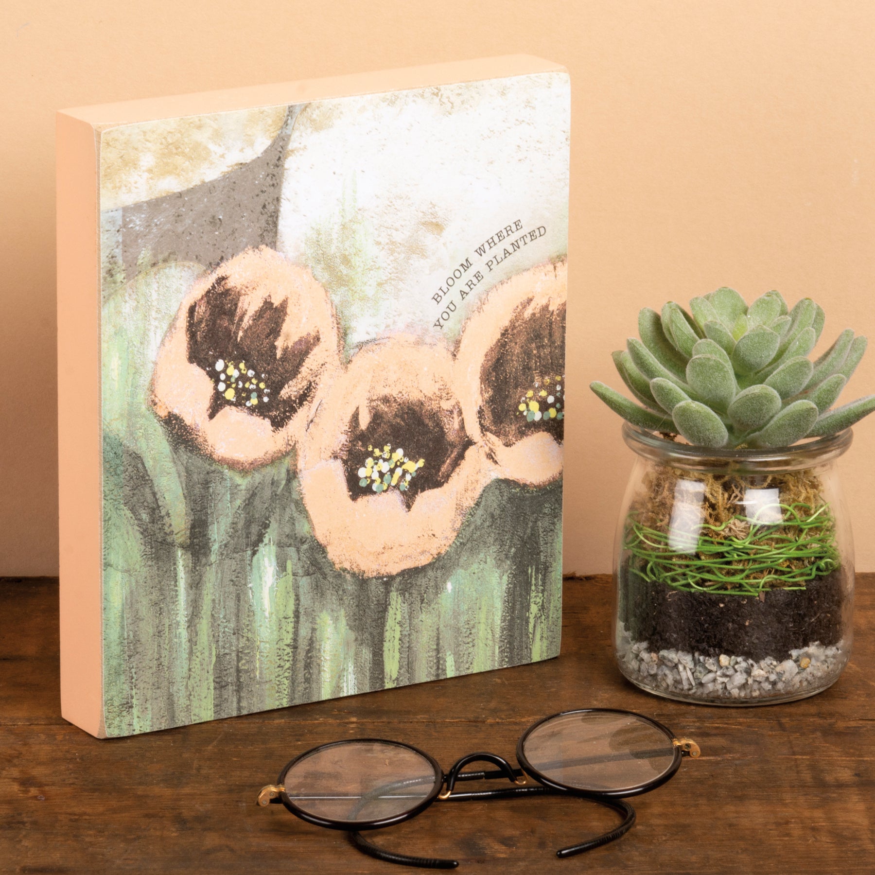 Bloom Where You Are Planted wooden block sign with floral designs, featuring an inspirational message, perfect for home decor.