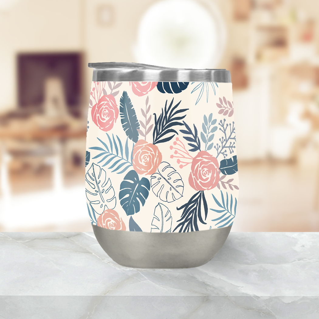 Blue & Blush Tropical Floral Stemless Wine Tumbler with vibrant floral design, perfect for outdoor use.