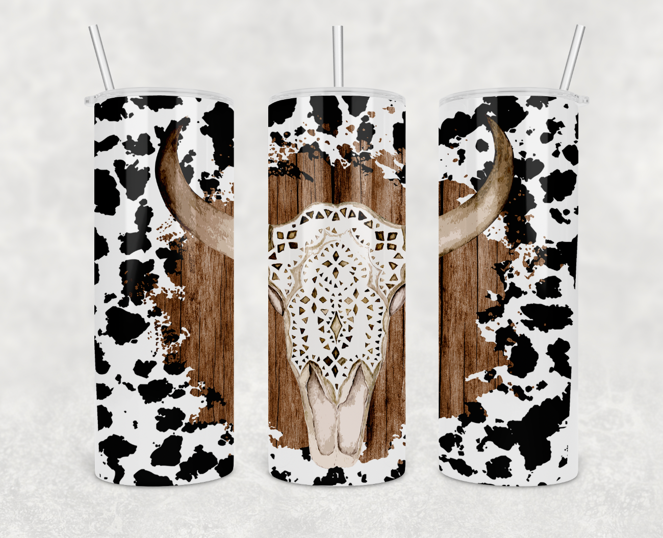 Boho Cow Print 20oz Skinny Tumbler with stainless steel body and clear lid, featuring a stylish cow print design.