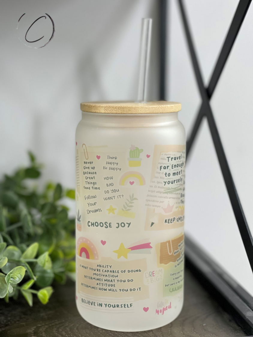 A stylish 16oz Libbey glass tumbler featuring boho daily affirmations, complete with a reusable straw, showcasing its unique design.