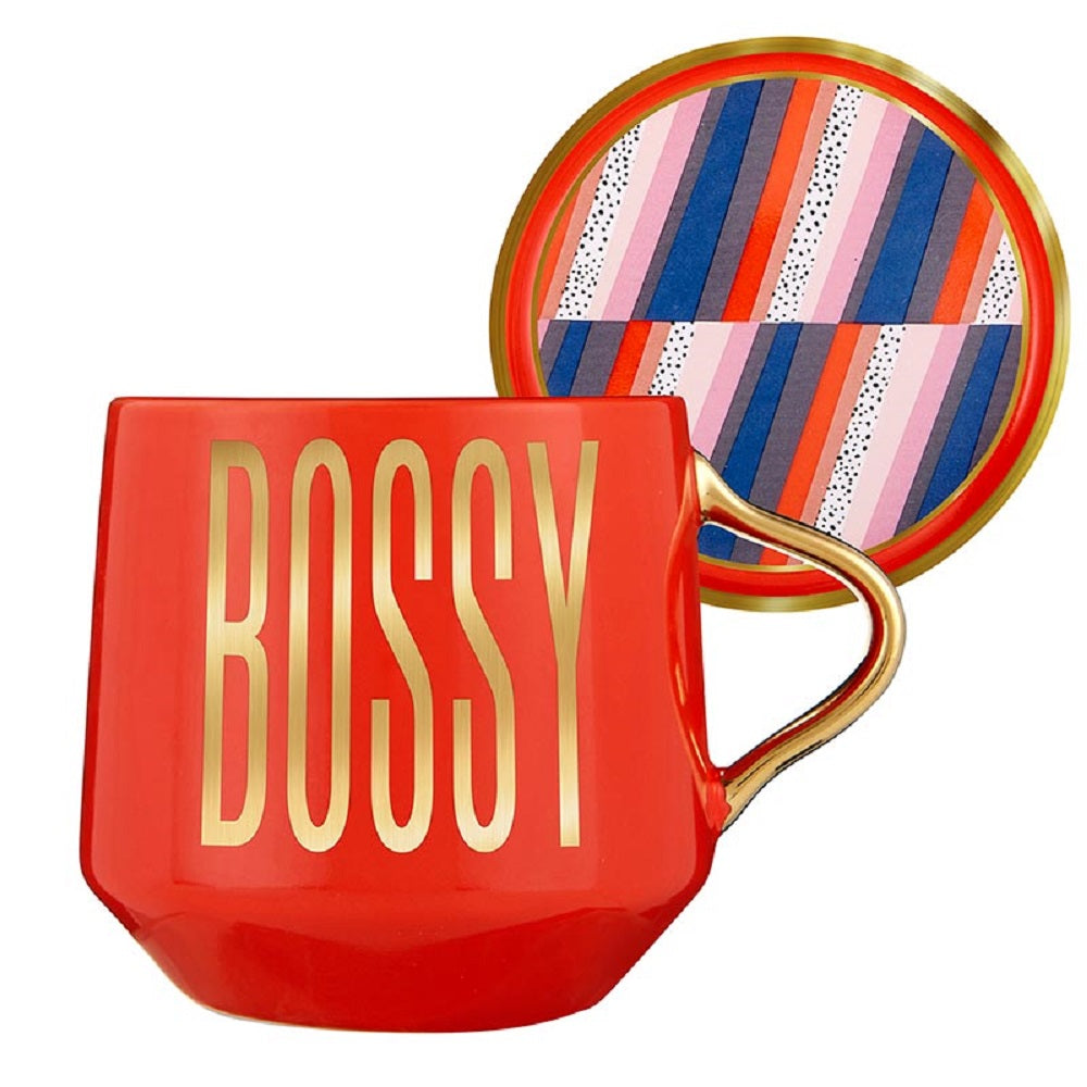 A stylish red and gold ceramic mug with 'BOSSY' printed on it, accompanied by a matching coaster lid.