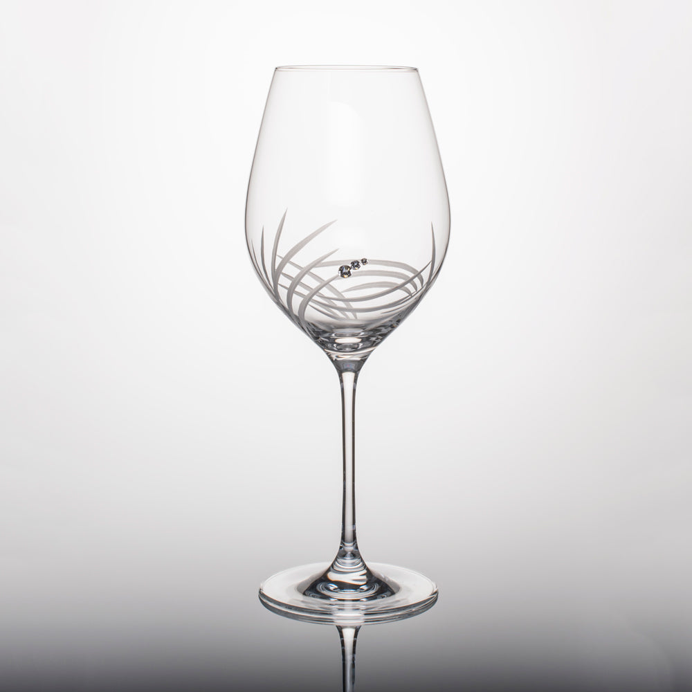 Set of 2 Breeze White Wine Glasses with Swarovski crystals in an elegant gift box, showcasing intricate hand-cut designs.