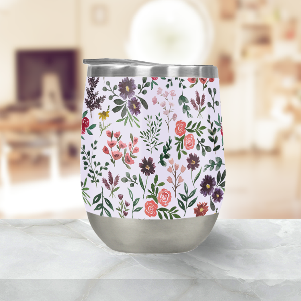 Bright Watercolor Flower Stemless Wine Tumbler in purple with floral design, perfect for outdoor use.
