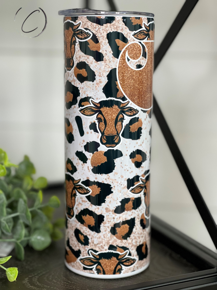 Bronze Leopard Carhartt 20oz Skinny Tumbler with a stylish leopard print design, featuring a reusable straw.