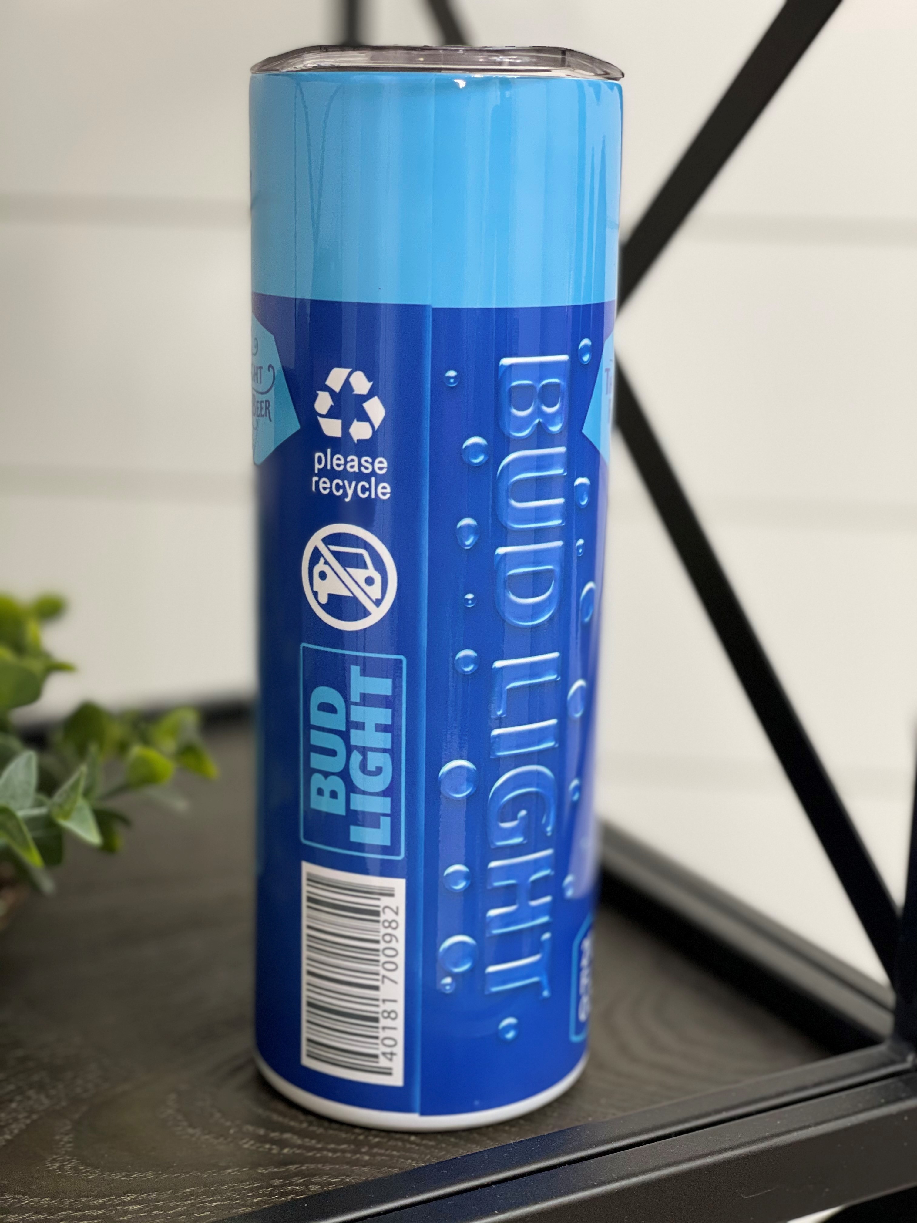 Bud Light 20oz Skinny Tumbler featuring a vibrant full wrap design, perfect for keeping drinks hot or cold.