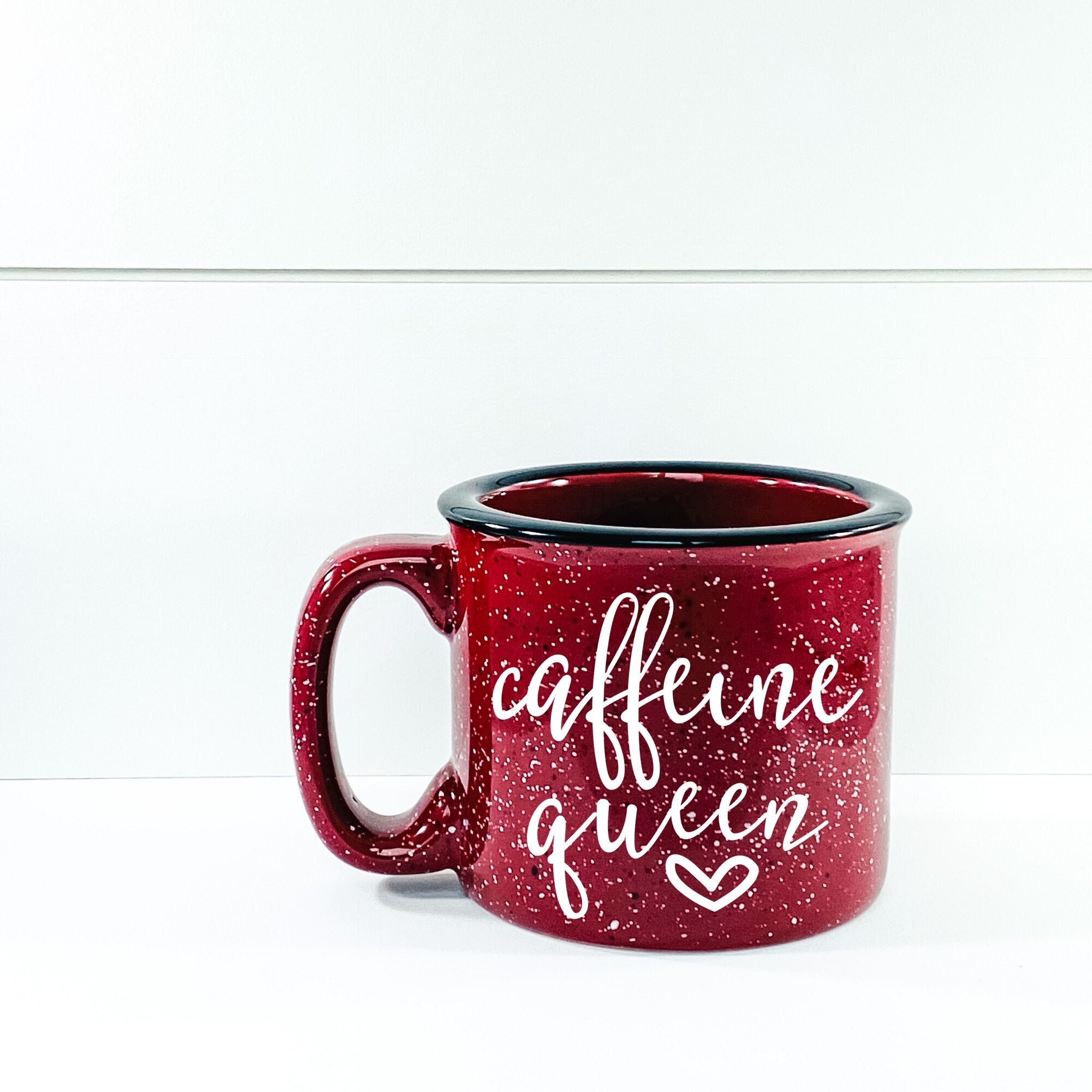 Caffeine Queen Campfire Mug with a stylish design, perfect for coffee lovers, featuring a durable ceramic construction.