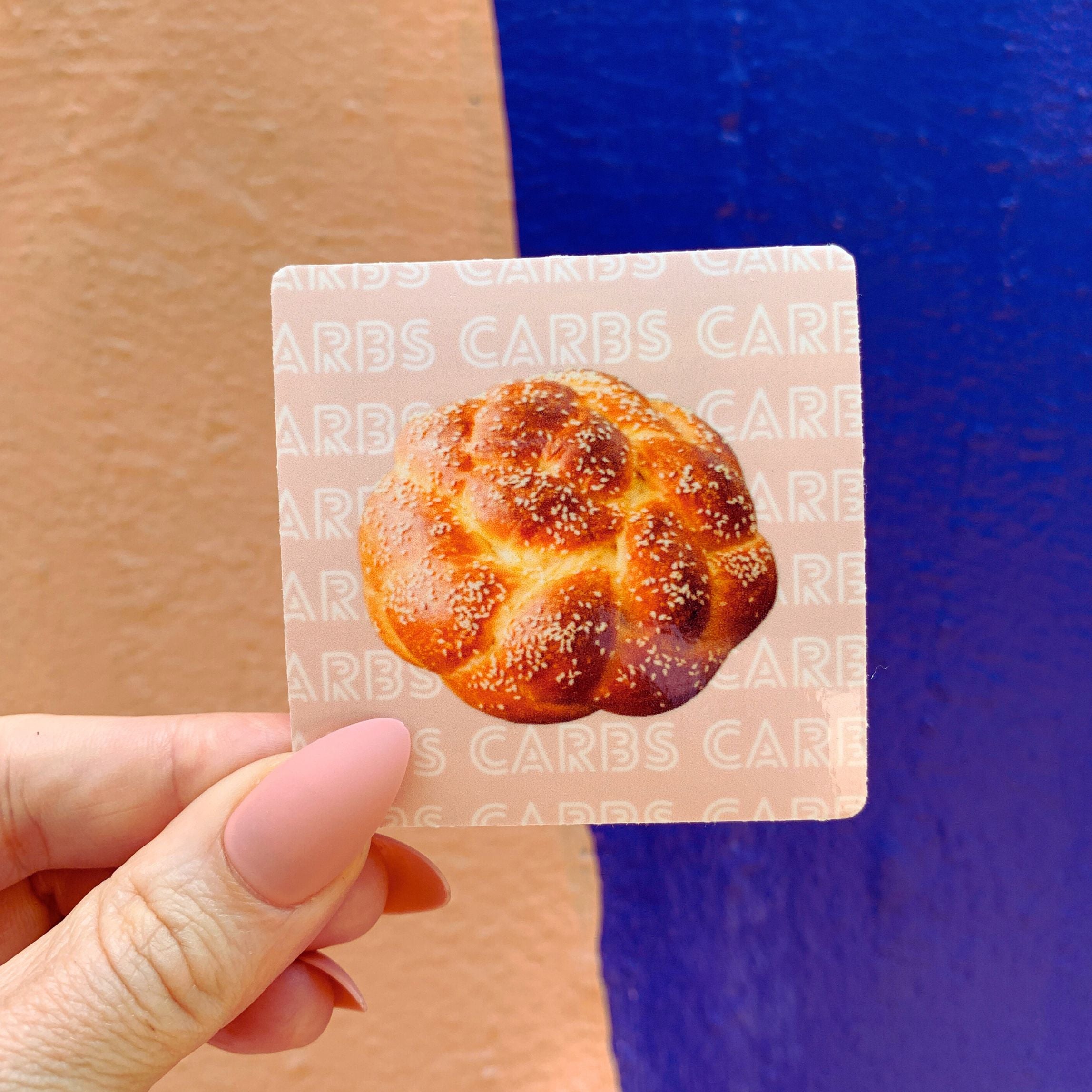 CARBS CARBS CARBS sticker featuring the phrase 'Carbs Care' in a vibrant design, perfect for personalizing items.