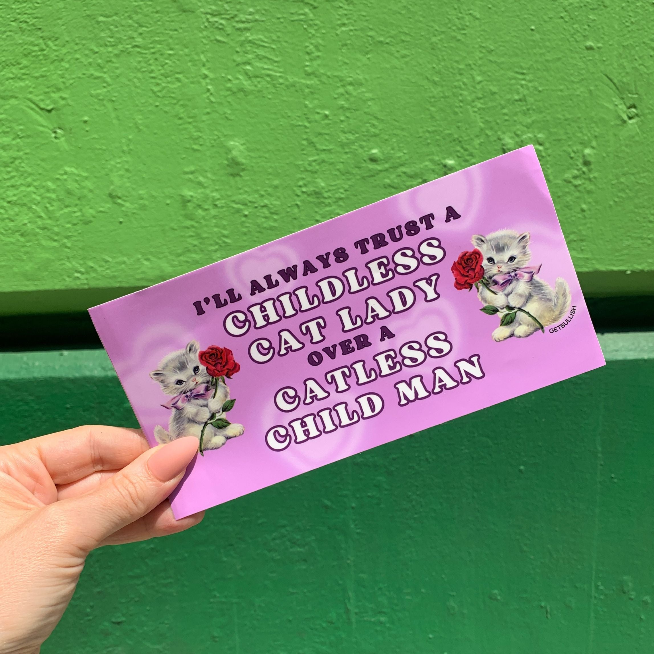 A humorous bumper sticker featuring the phrase 'I’ll Always Trust a Childless Cat Lady Over a Catless Child Man', perfect for cat lovers.