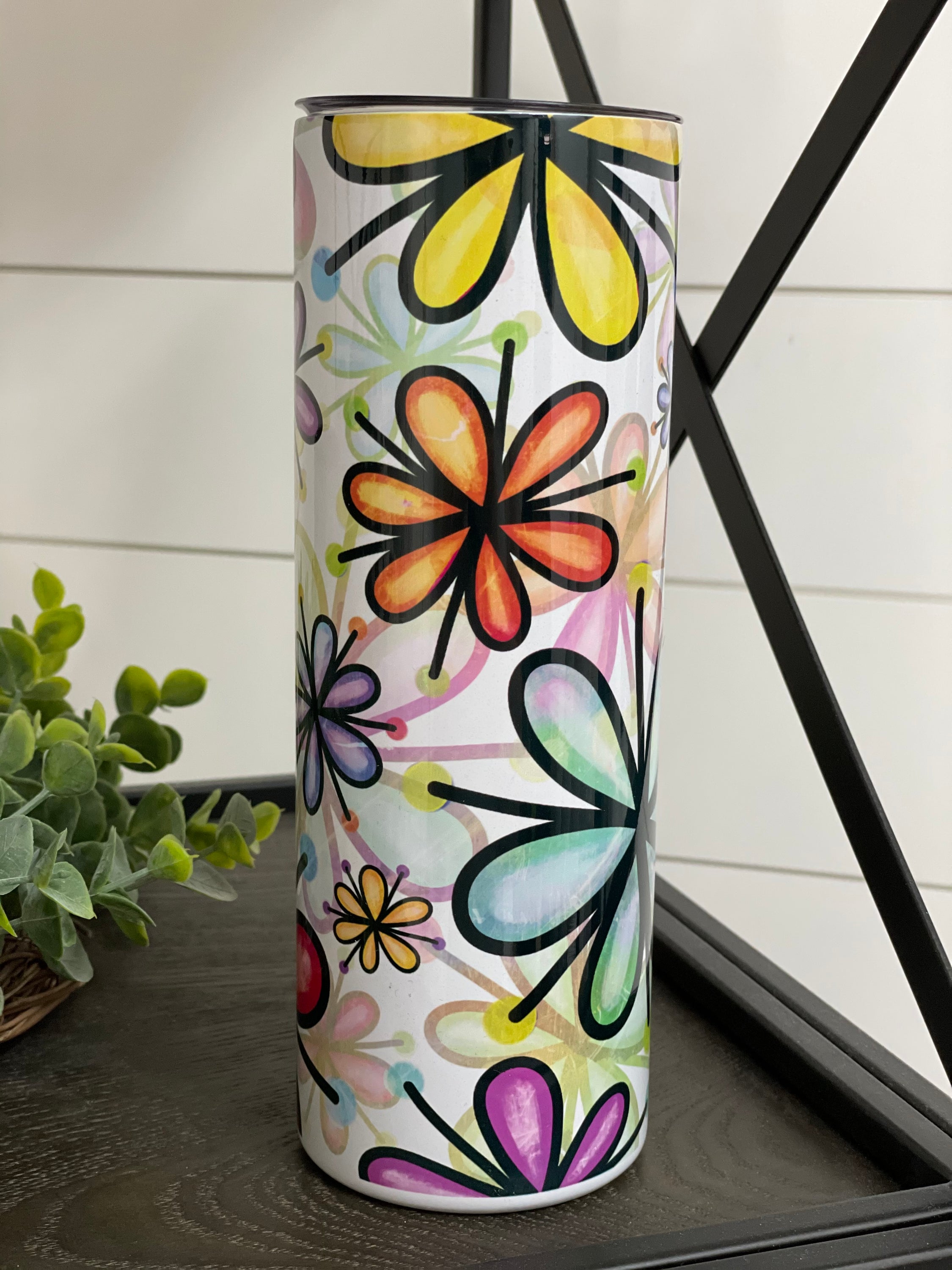 Colorful Daisies 20oz Skinny Tumbler featuring a vibrant floral design, perfect for hydration on the go.