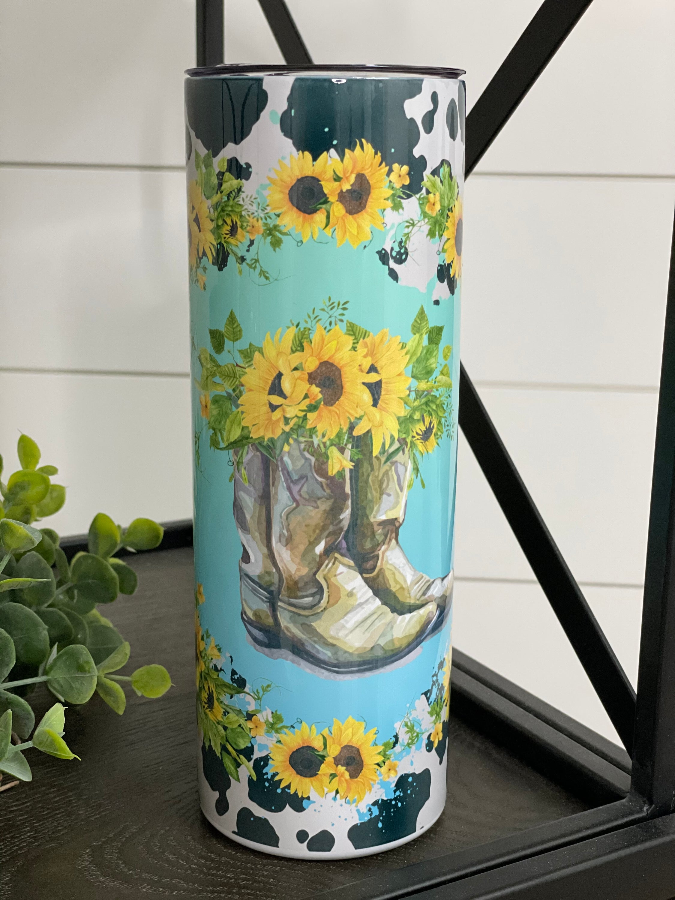 Cowgirl Boots 20oz Skinny Tumbler featuring a full wrap distressed design with a reusable straw.