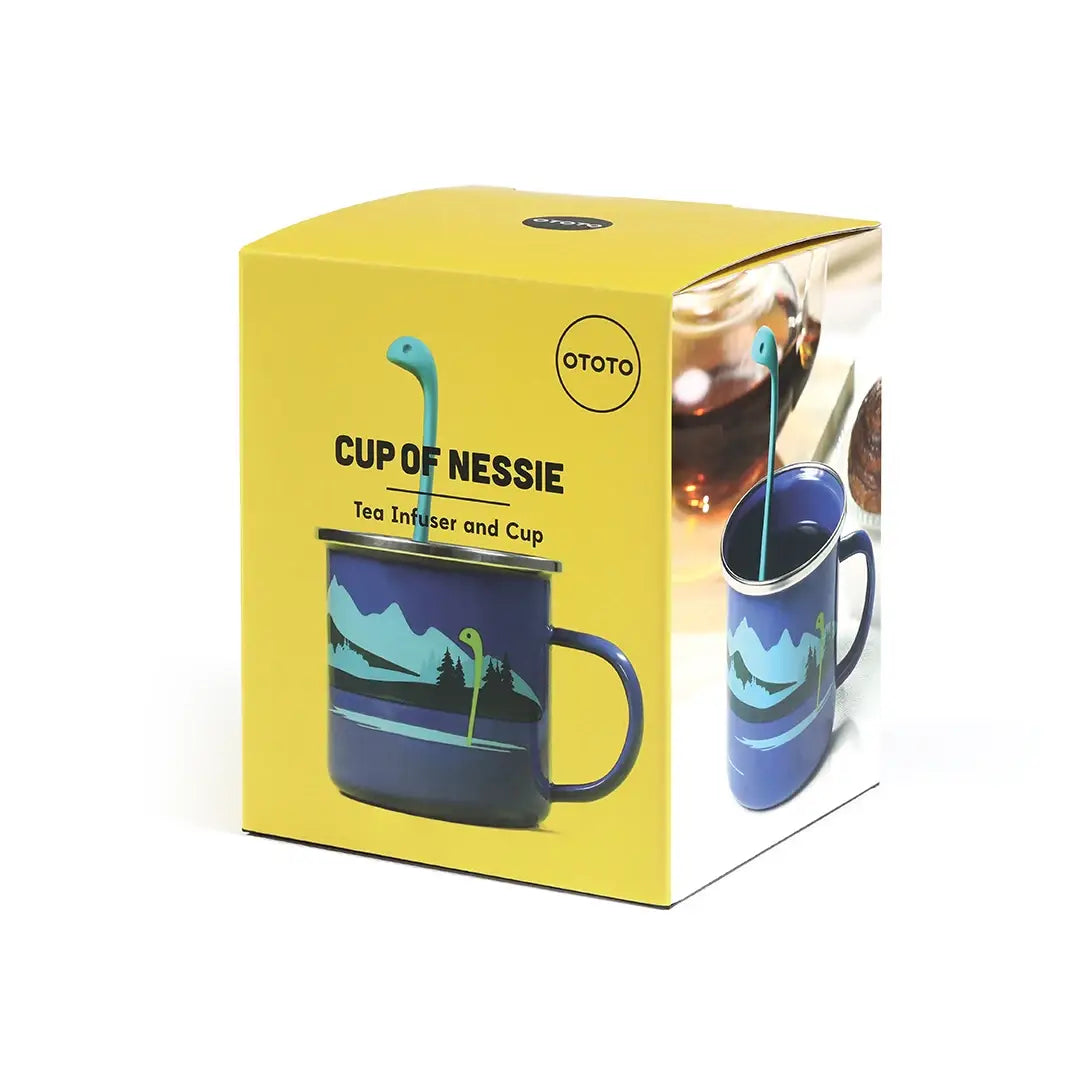 Cup of Nessie Blue Dinosaur Tea Infuser and Cup featuring a playful dinosaur design, made from BPA-free materials, perfect for brewing tea.