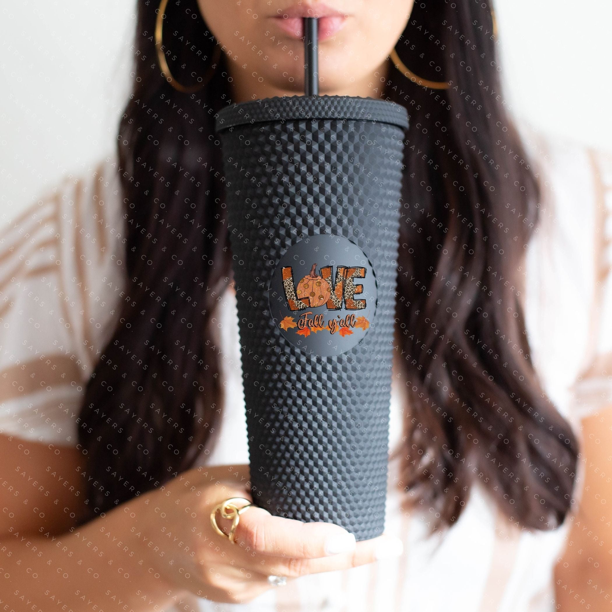 Custom Studded 24oz Double Walled Tumbler featuring 'Love Fall Yall' design with autumn-themed graphics, perfect for seasonal drinks.