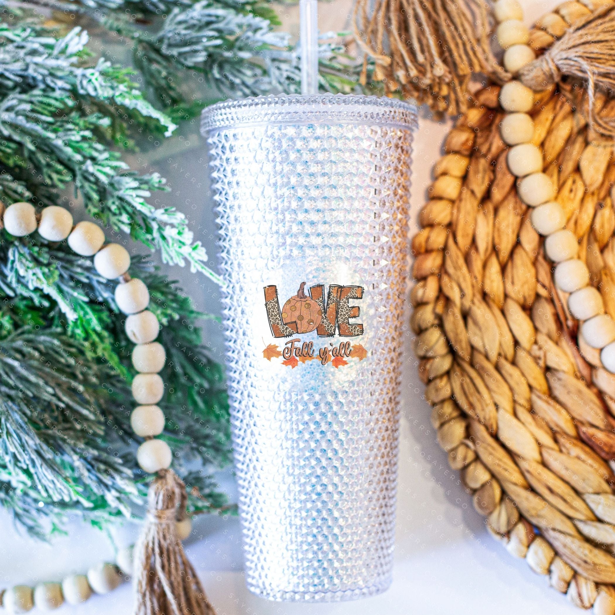 Custom Studded 24oz Double Walled Tumbler featuring 'Love Fall Yall' design with autumn-themed graphics, perfect for seasonal drinks.