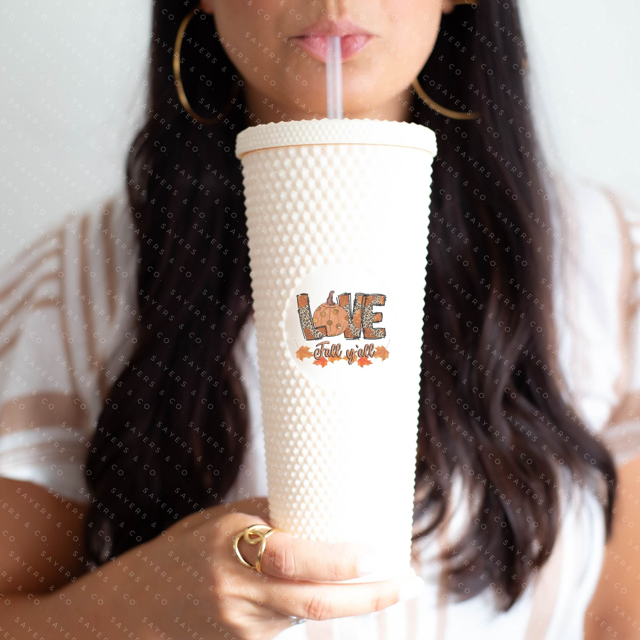 Custom Studded 24oz Double Walled Tumbler featuring 'Love Fall Yall' design with autumn-themed graphics, perfect for seasonal drinks.