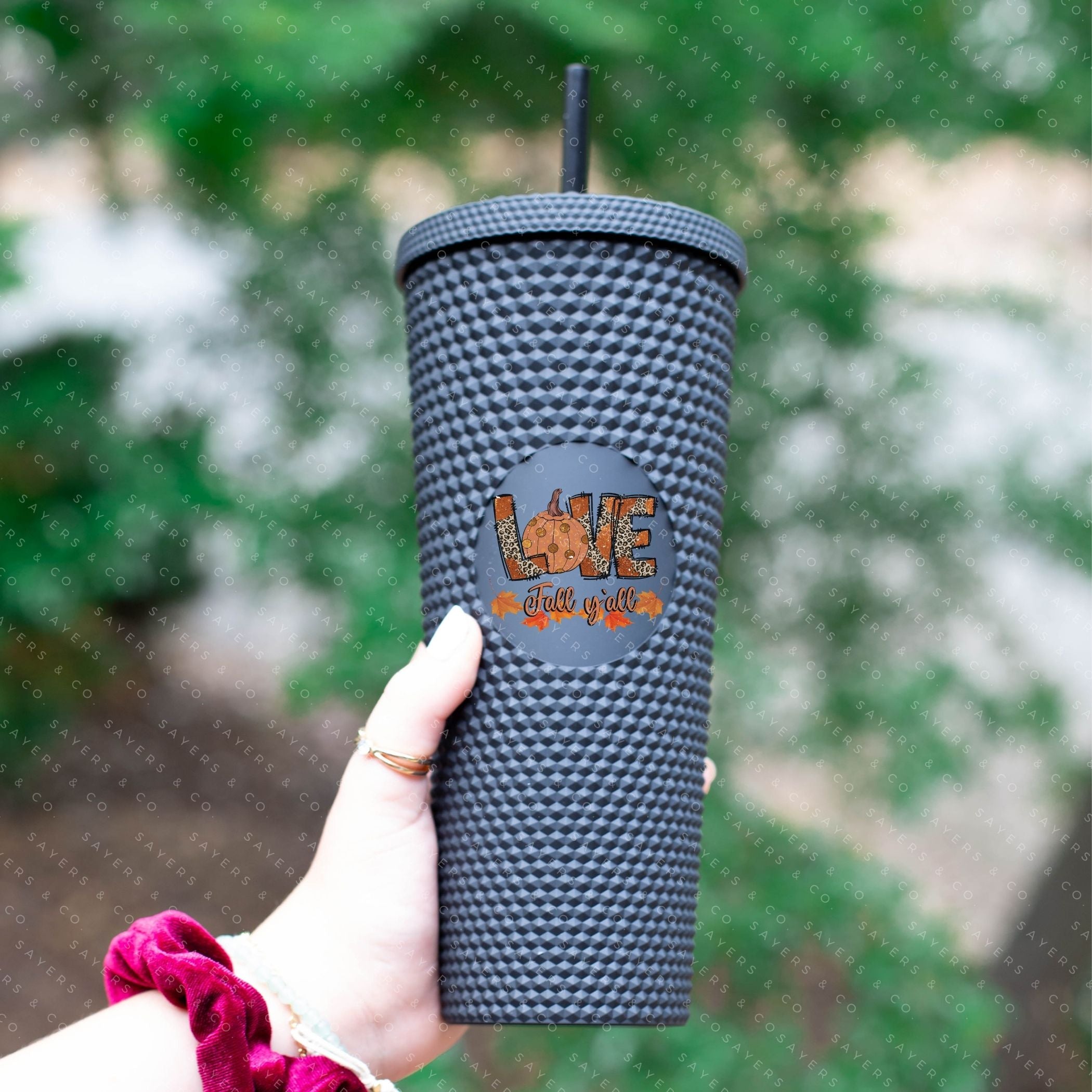 Custom Studded 24oz Double Walled Tumbler featuring 'Love Fall Yall' design with autumn-themed graphics, perfect for seasonal drinks.