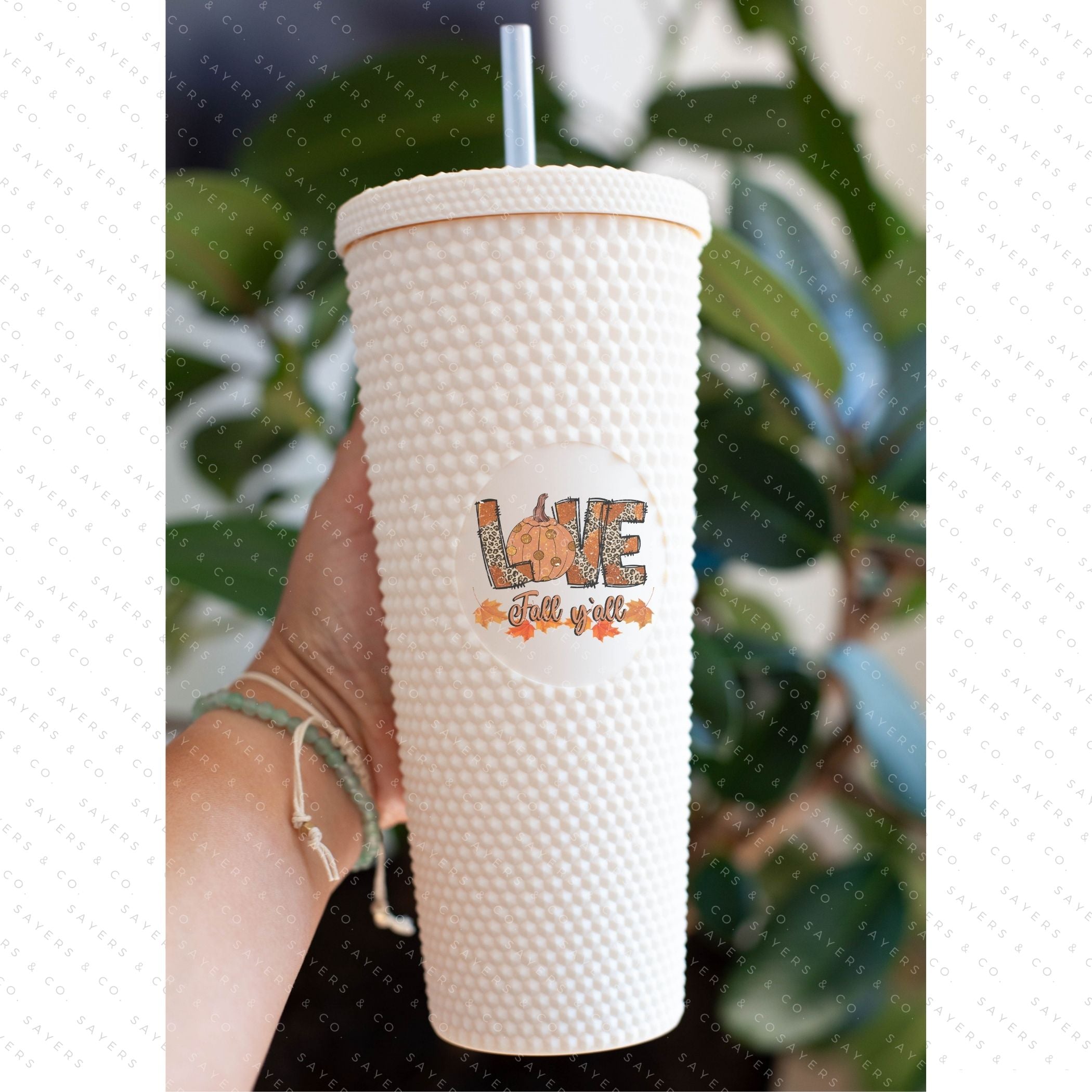 Custom Studded 24oz Double Walled Tumbler featuring 'Love Fall Yall' design with autumn-themed graphics, perfect for seasonal drinks.