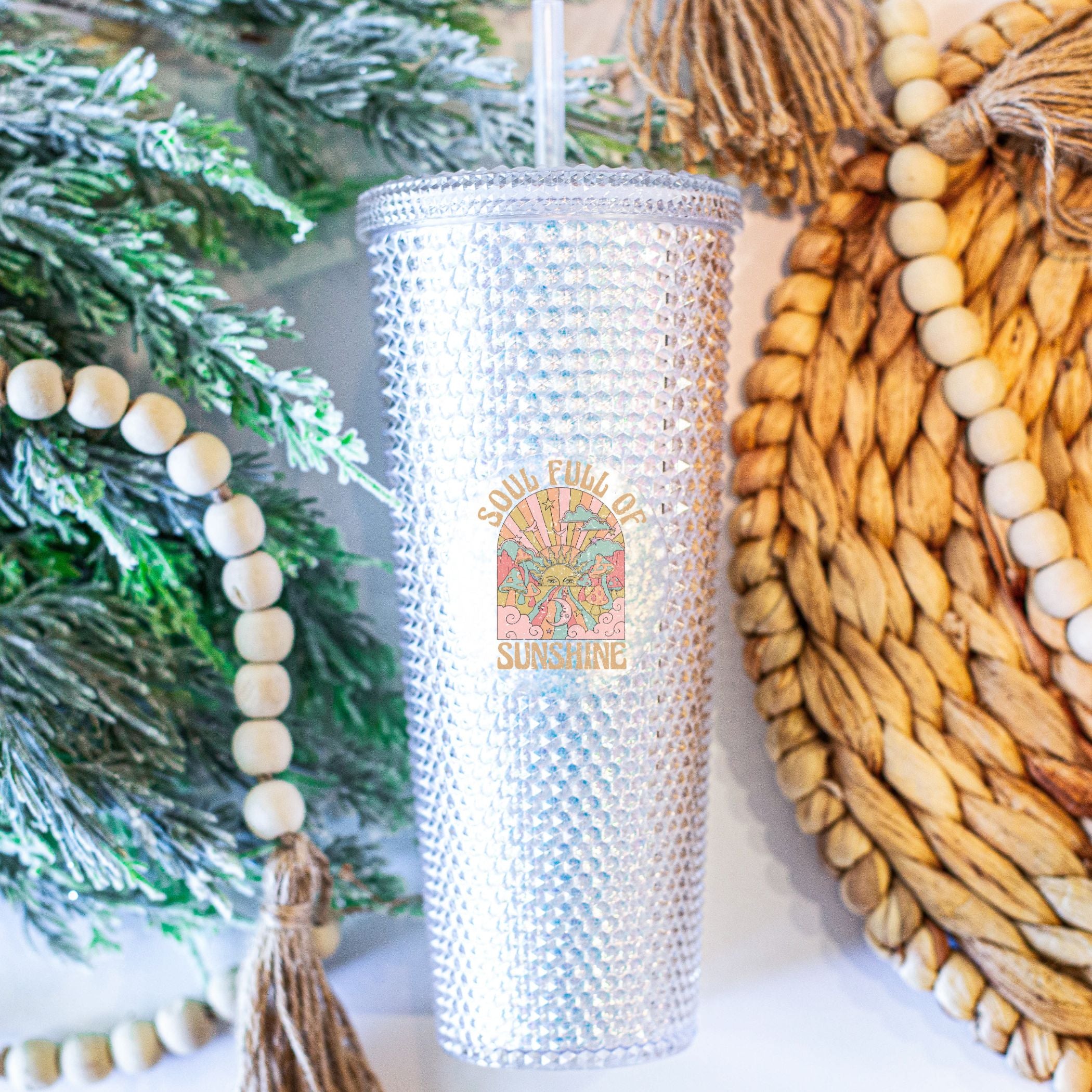 Custom studded 24oz double walled tumbler featuring a beach-themed design with seashells and waves, perfect for summer drinks.