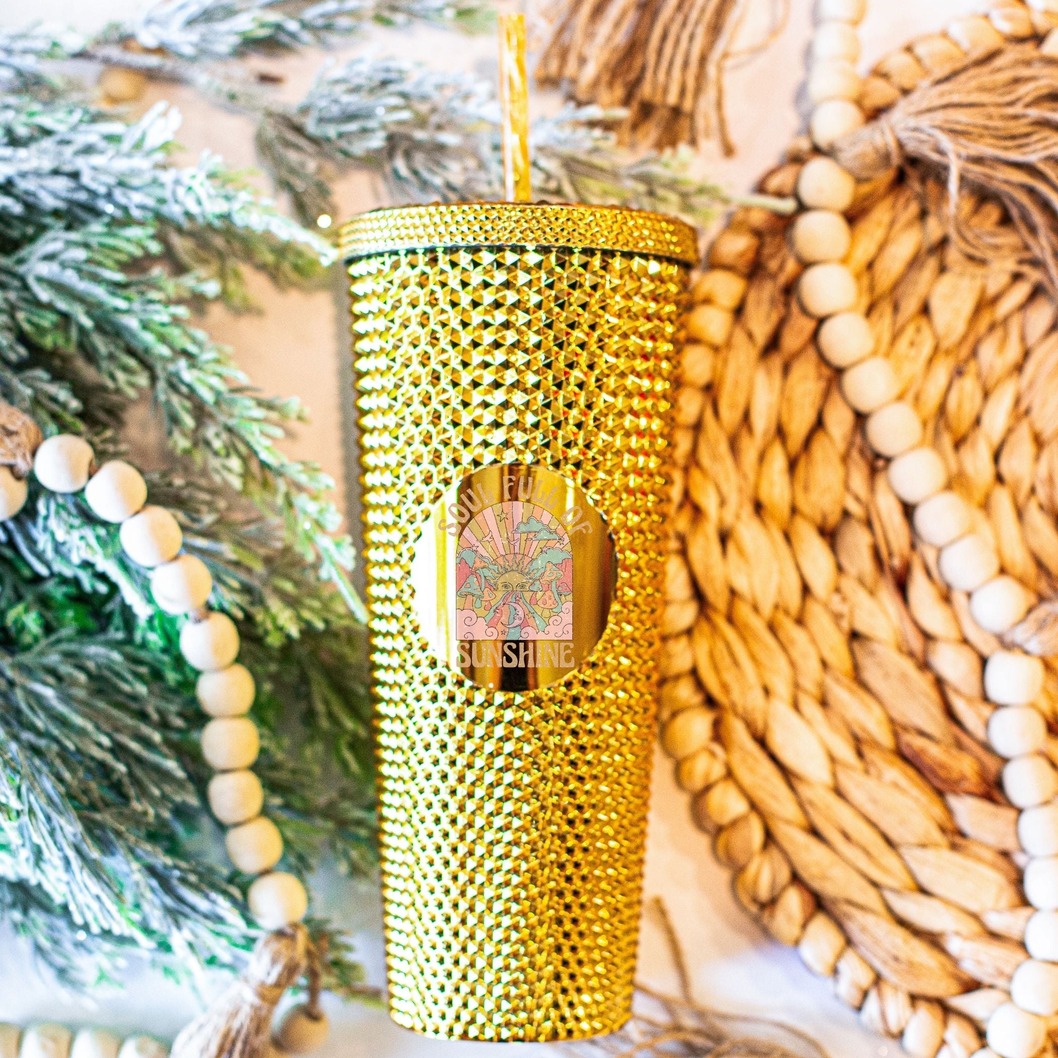 Custom studded 24oz double walled tumbler featuring a beach-themed design with seashells and waves, perfect for summer drinks.