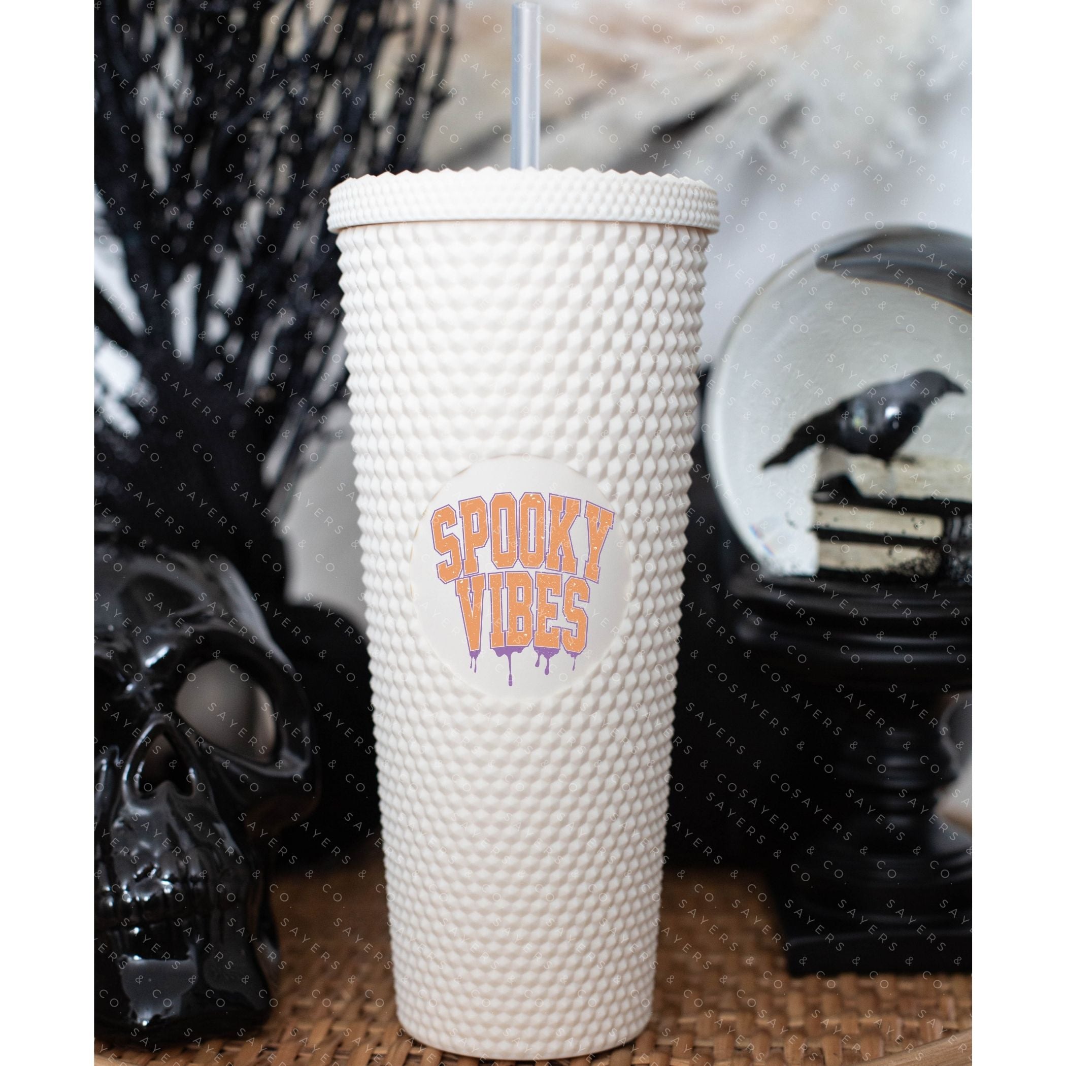 Custom Studded 24oz Double Walled Tumbler featuring 'Spooky Mama' design with Halloween graphics, perfect for seasonal drinks.