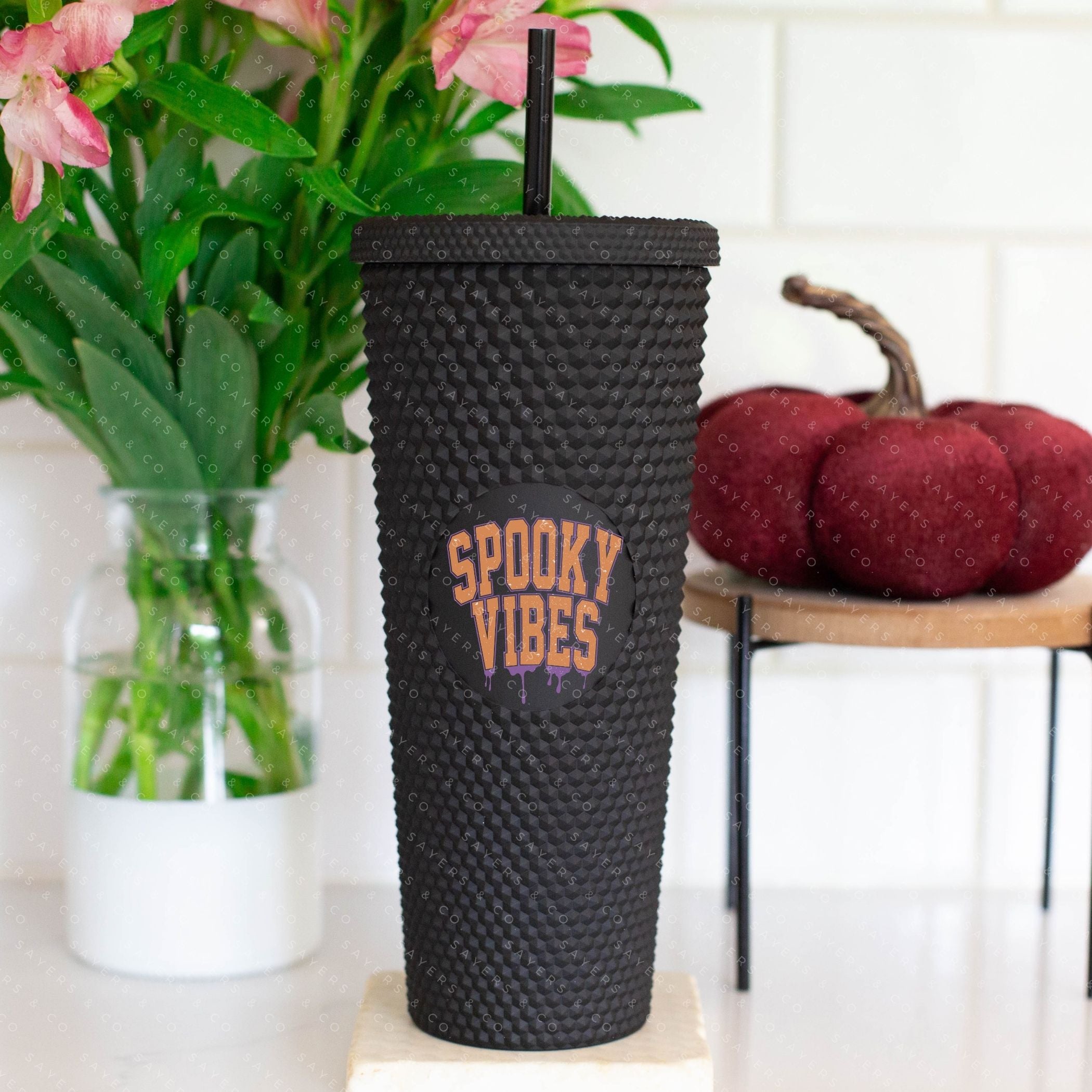Custom Studded 24oz Double Walled Tumbler featuring 'Spooky Mama' design with Halloween graphics, perfect for seasonal drinks.