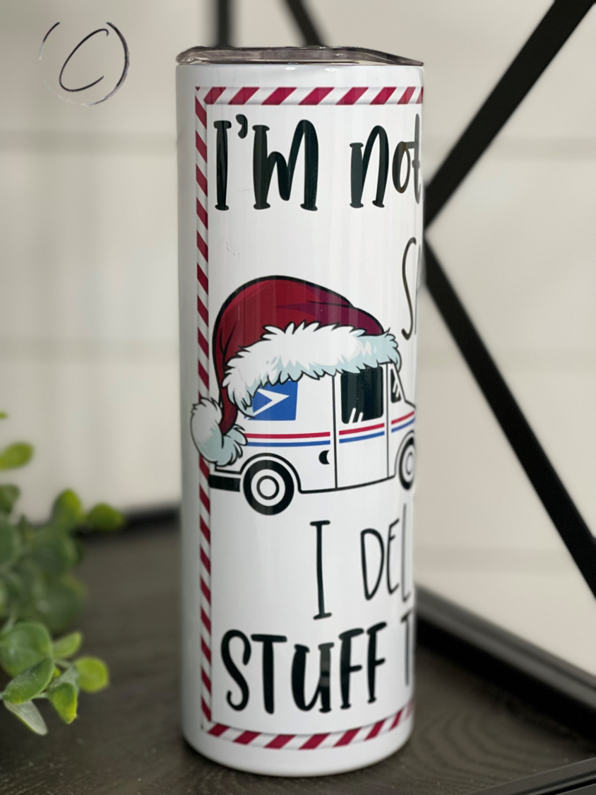 Delivered More Stuff Than Santa 20oz Skinny Tumbler with festive design and reusable straw.