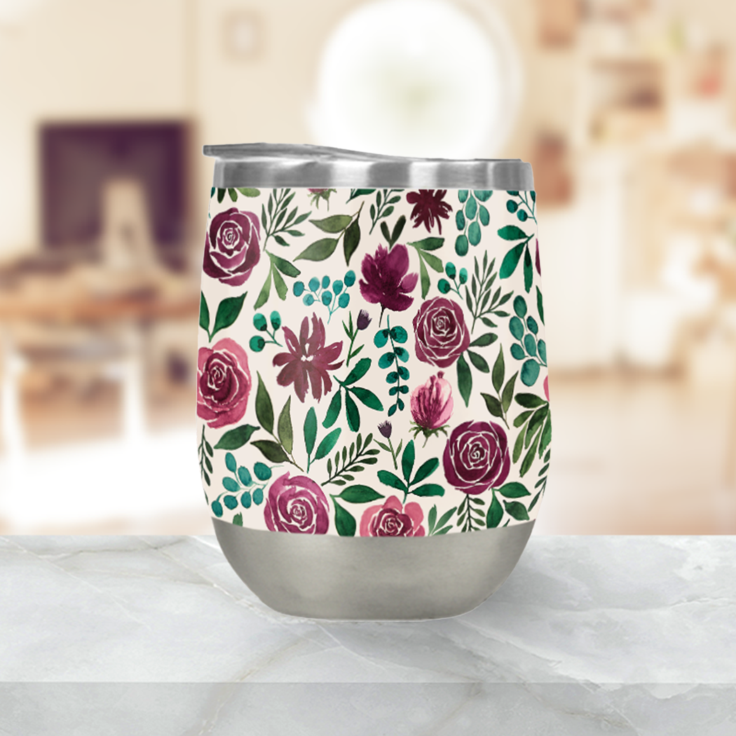 Deep Magenta Floral Eucalyptus Stemless Wine Tumbler showcasing vibrant floral design and stainless steel construction.