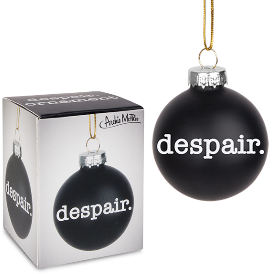 A 2-inch black glass ornament with a despair theme, featuring a string for hanging, symbolizing holiday angst.