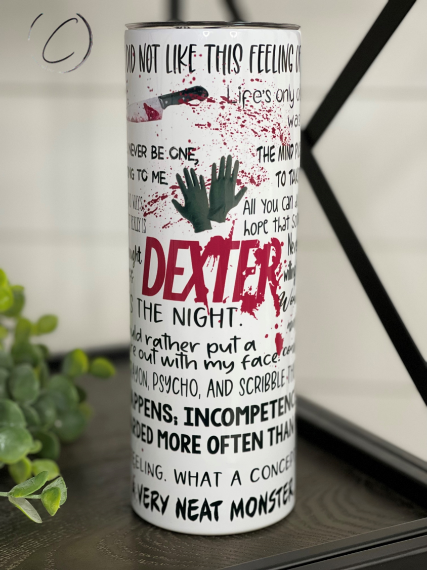 Dexter 20oz Skinny Tumbler with a sleek design and reusable straw, perfect for hot and cold beverages.