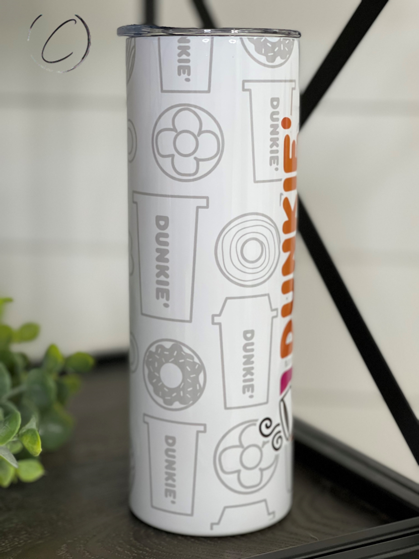 Dunkie Junkie 20oz Skinny Tumbler with vibrant full wrap design and reusable straw.