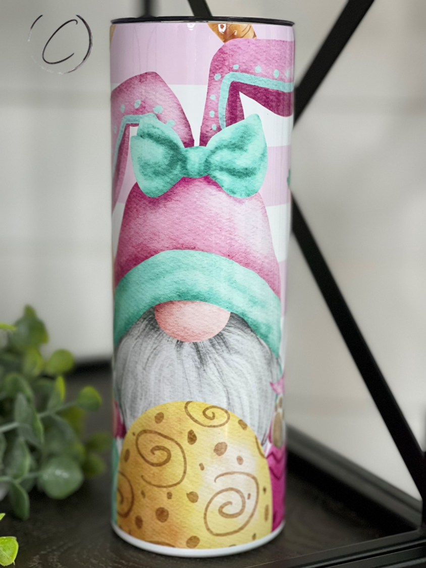 Easter Bunny Gnomes 20oz Skinny Tumbler featuring a colorful design of gnomes celebrating Easter, complete with a reusable straw.