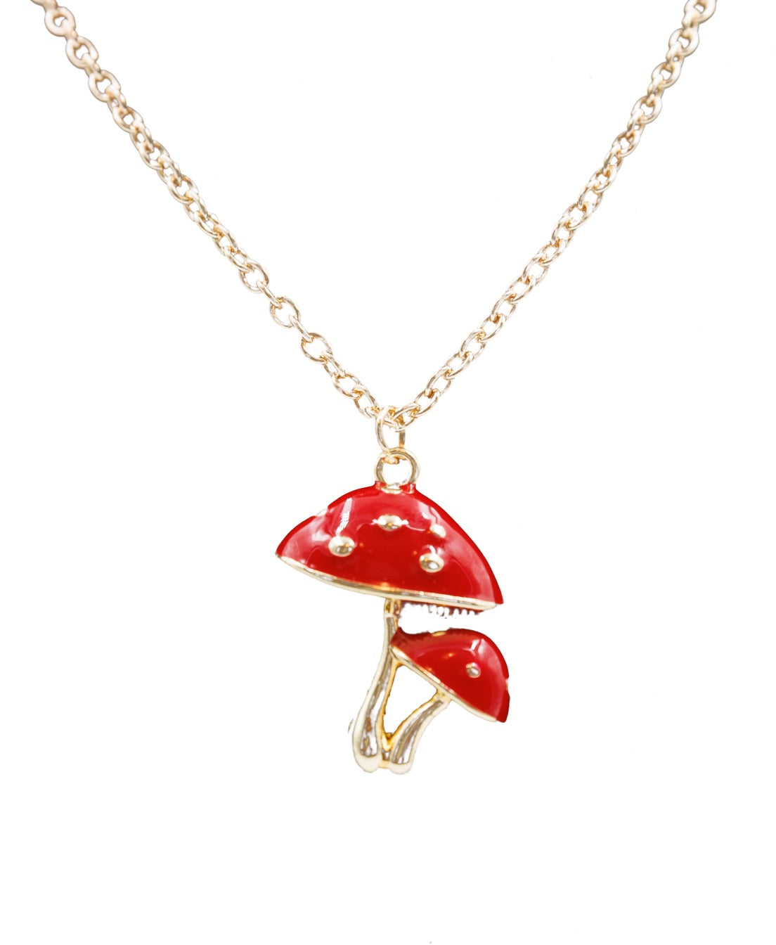 Gold necklace featuring a cute red toadstool mushroom charm on a fine chain, elegantly displayed in a gift box.