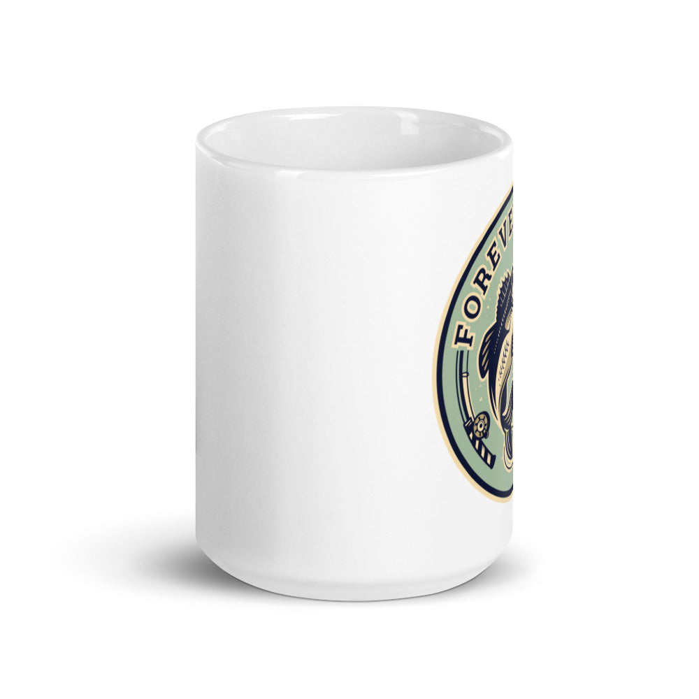 A ceramic Forever Fishing Coffee Mug featuring a fishing-themed design, available in two sizes, perfect for coffee lovers.