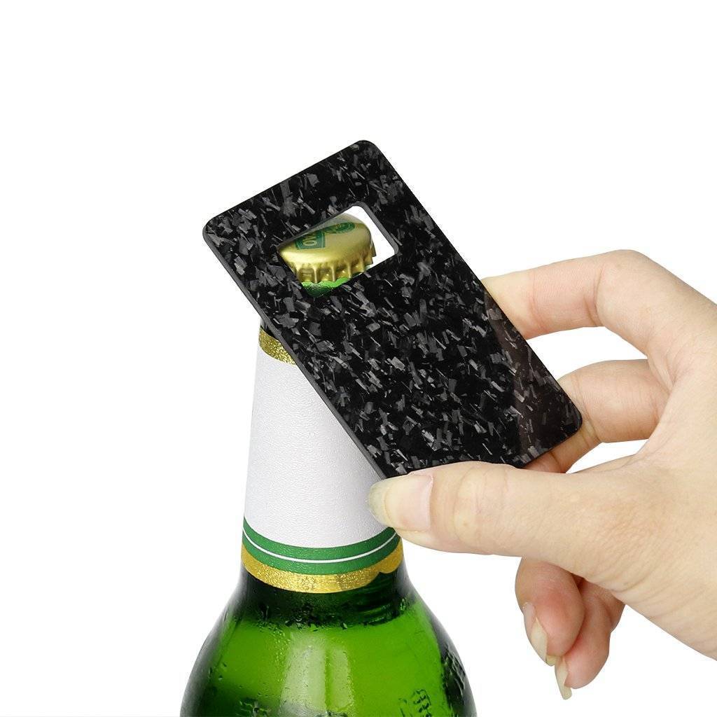 Forged Carbon Fiber Credit Card Size Bottle Opener showcasing its sleek design and lightweight material.