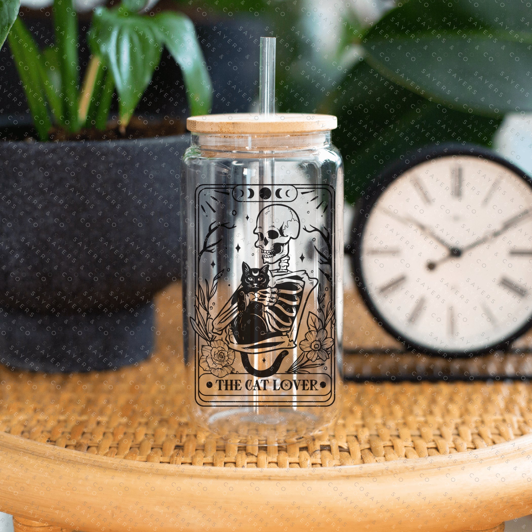 Funny Tarot Card Glass Cup with bamboo lid and straw, showcasing a whimsical design perfect for drinks.