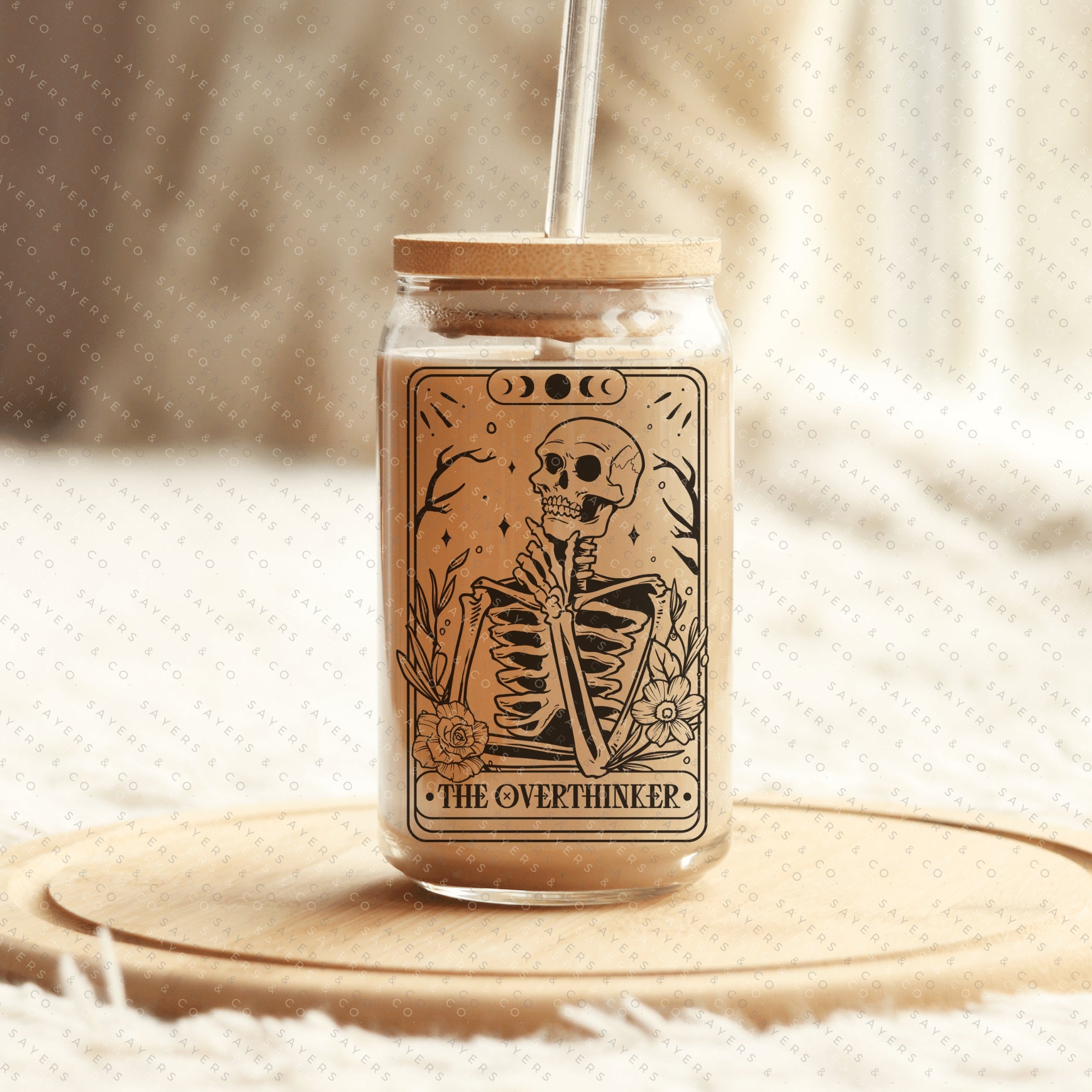 Funny Tarot Card Glass Cup with bamboo lid and straw, showcasing a whimsical design perfect for drinks.