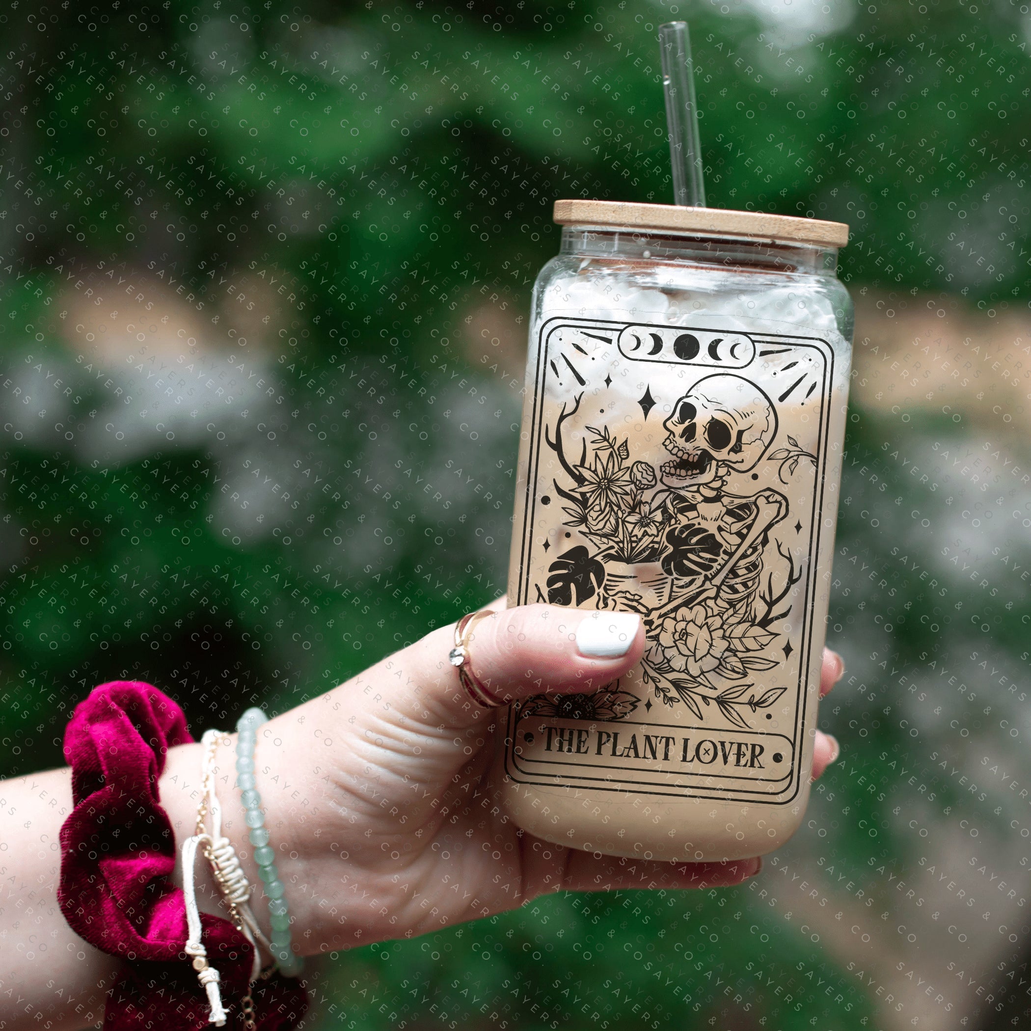 Funny Tarot Card Glass Cup with bamboo lid and straw, showcasing a whimsical design perfect for drinks.