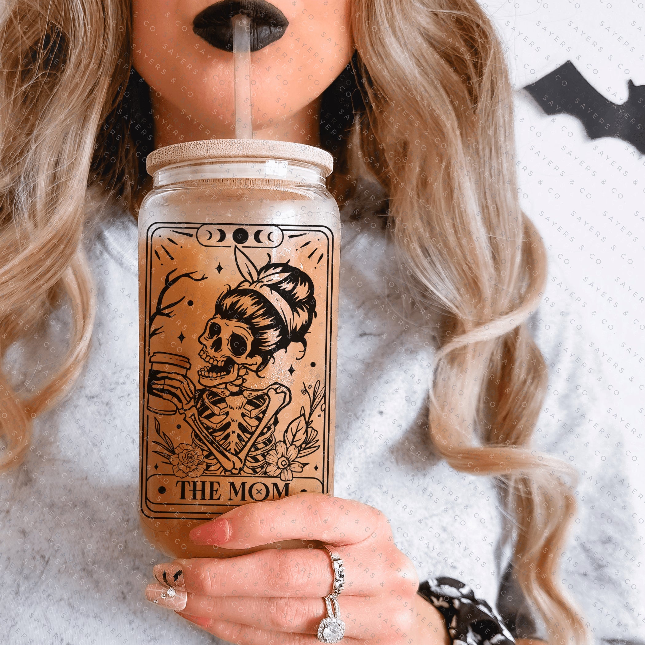 Funny Tarot Card Glass Cup with bamboo lid and straw, showcasing a whimsical design perfect for drinks.