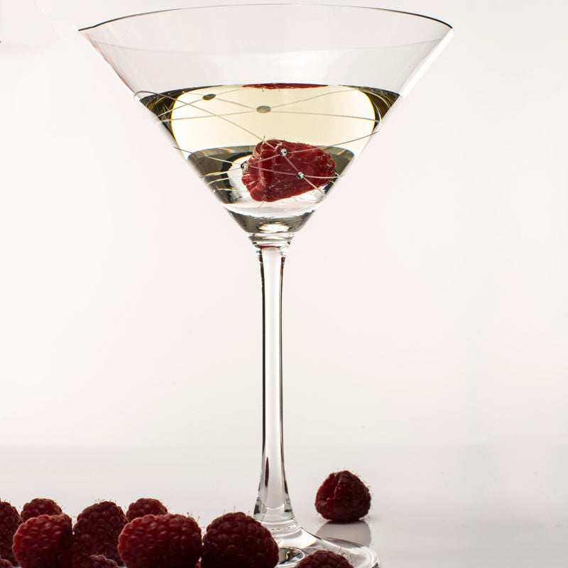 Set of two Galaxy Spirals Martini Glasses with intricate spiral design and crystal stones, elegantly displayed in a gift box.